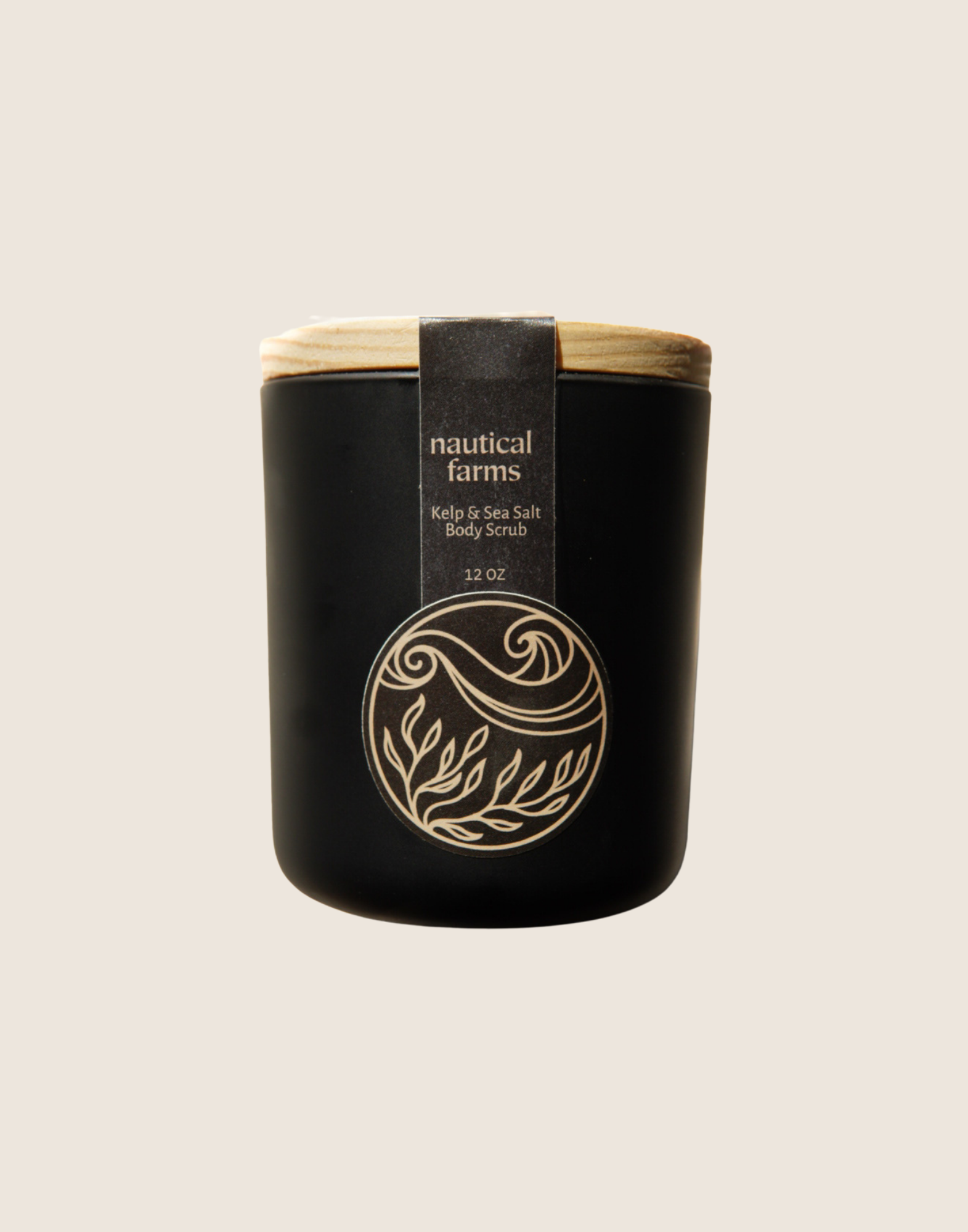 Kelp-infused sea salt body scrub with lemongrass scent. Natural exfoliant and moisturizer from Maine Seaweed Company Nautical Farms. 12 oz comes in reusable black matte jar with raw wood lid.